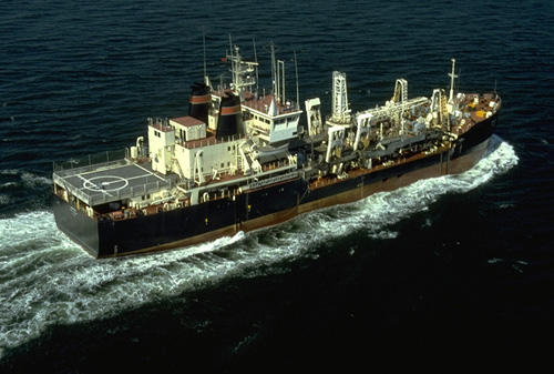 An overhead shot of the dredging vessel Essayons as it powers through the water.