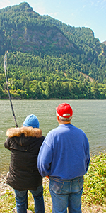 Image of a couple trying their luck fishing at the North Shore Recreation Area.